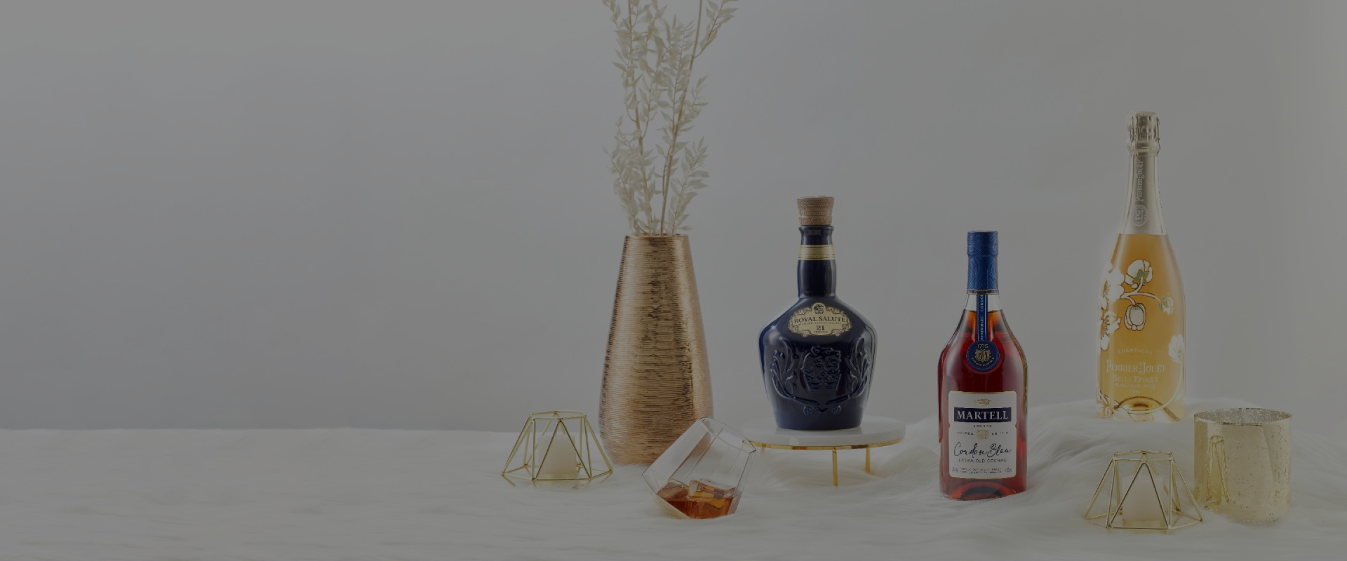 Bottles of Royal Salute, Martell and Perrier Jouët
